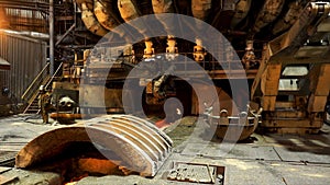 Steelworkers standing near a blast furnace with sparks at the metallurgical plant, heavy industry concept. Stock footage