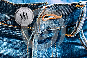 Steem coin instead of buttons on jeans.