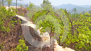 Steep adobe cliff of Pai Canyon, Thailand