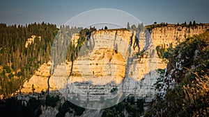 The steep cliffs of Creux du Van area in Switzerland