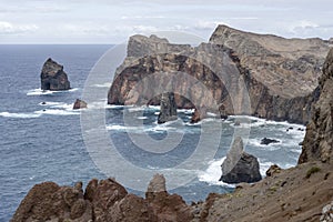 Steep cliffs of  island northern shore on Atlantic ocean, Ponta do Rosto, Madeira photo