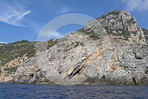 steep cliffs at Uomo cape, Argentario, Italy photo