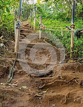 Steep climb on dirt path up hillside