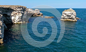 Steep coast with karst caves and grottoes near the village of Tyulenovo, Bulgary