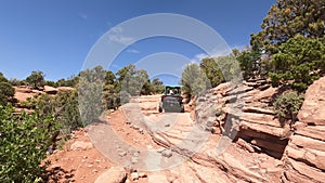 Steep dangerous cliff trail UTV Moab Utah POV 4K