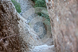 Steep descent on a stone staircase