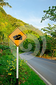 Steep grade hill traffic sign on road