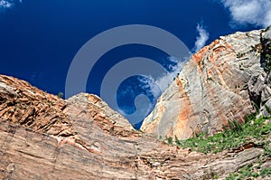 Steep sandstone cliff and sky