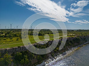 Steep sea coast of the Baltic Sea in Paldiski, camping with tents in summer