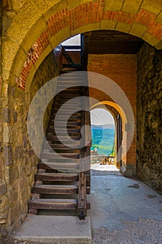 steep stairway and a gate of the visegrad castle in hungary....IMAGE