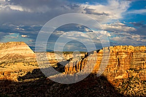 Steep stone walls and dramatic sky in Colorado National Monument near the towns of Grand Junction and Fruita