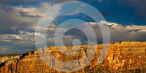 Steep stone walls and dramatic sky in Colorado National Monument near the towns of Grand Junction and Fruita