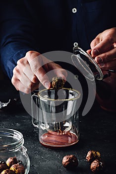 Steeping tea in glass mug
