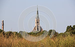 Steeple of the Church of St. Joachim and St. Anne at Mount Loretto, view across the fields, Staten Island, NY