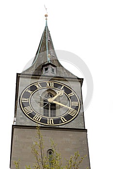 Steeple of St. Peter church in Zurich with large clock face