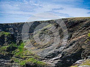 Steeply inclined eroded rock strata on Funzie Ness on the island of Fetlar in Shetland, Scotland, UK