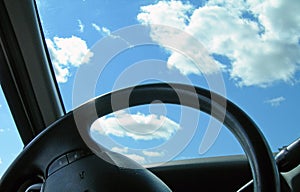 Steering Wheel and Blue Sky