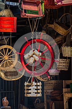 Steering wheel of a boat at a bazaar