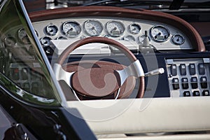 Steering wheel and dashboard of a luxury yacht