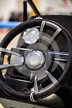 Steering wheel and dashboard of a motor boat