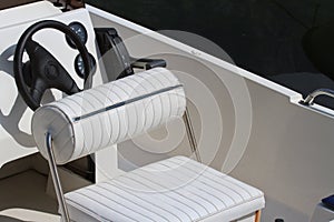Steering wheel and dashboard of the yacht. Place seat captain