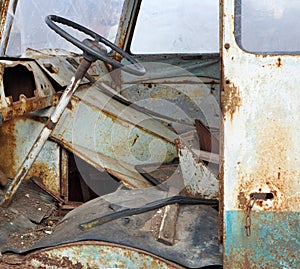 Inside the ruined cabin of an old broken bus