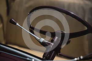 Steering wheel and lever on a vintage car