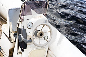 Steering wheel on a luxury yacht cabin