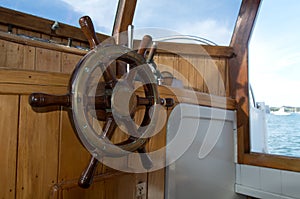 Steering wheel of old boat