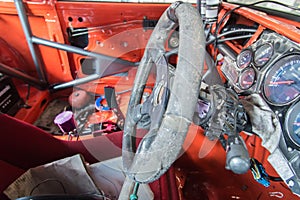 Steering wheel , old interior of ruined truck