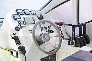 Steering wheel the ship of speedboats photo