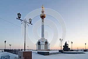 Stele and a monument in Yakutsk photo