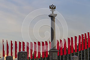 Stella and red flags on the square of the station of Rostov-on-Don, Russia