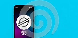 Stellar XLM symbol. Trade with cryptocurrency, digital and virtual money, banking with mobile phone concept. Business