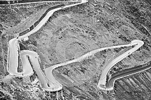 The Stelvio Road bends. Black and white photo