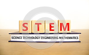 STEM science technology engineering mathematics symbol. Words STEM science technology engineering mathematics on white background