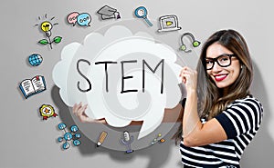 STEM text with woman holding a speech bubble