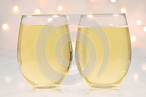 Stemless Wine Glass Mockup with White Wine and Lights