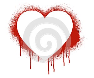 A stenciled heart painted with paint spray is seen
