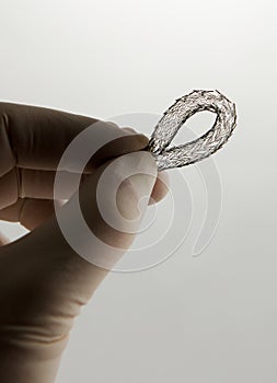 Stent for endovascular surgery, bend