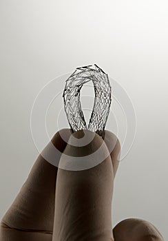 Stent for endovascular surgery, bent