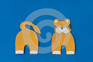 Step 5. Step by step instructions on how to make a tiger at home. Craft for New Year 2022. Take colored paper. A simple
