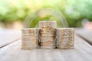 Step of coins stack for financial investment and business concept.