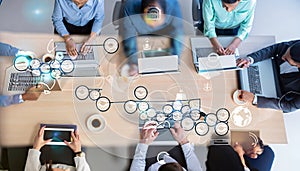 Digital composite of Business people working with devices and computers in meeting room