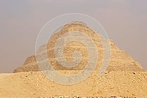 Step Pyramid of Djoser at Saqqara Egypt on a foggy morning