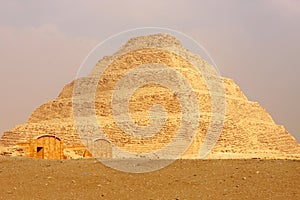 Step Pyramid of Djoser at Saqqara Egypt on a foggy morning