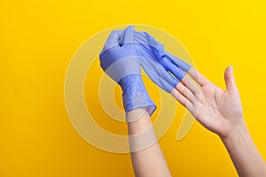 Step-by-step instructions on how to remove dirty gloves, doctor take off from hand glove