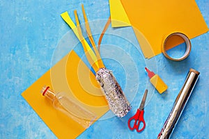 Step by step the production of child crafts to the Cosmonautics Day, rockets from plastic bottles, foil and colored paper. Step