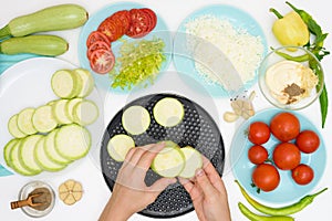 Step by step recipe and ingredients for cooking homemade zucchini mini portioned pizza with mozzarella and tomatoes