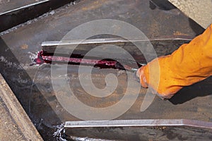 Step to use brush apply Liquid Penetrant into the welded for Non-Destructive Testing& x28;NDT& x29; with process Penetrant Testing photo